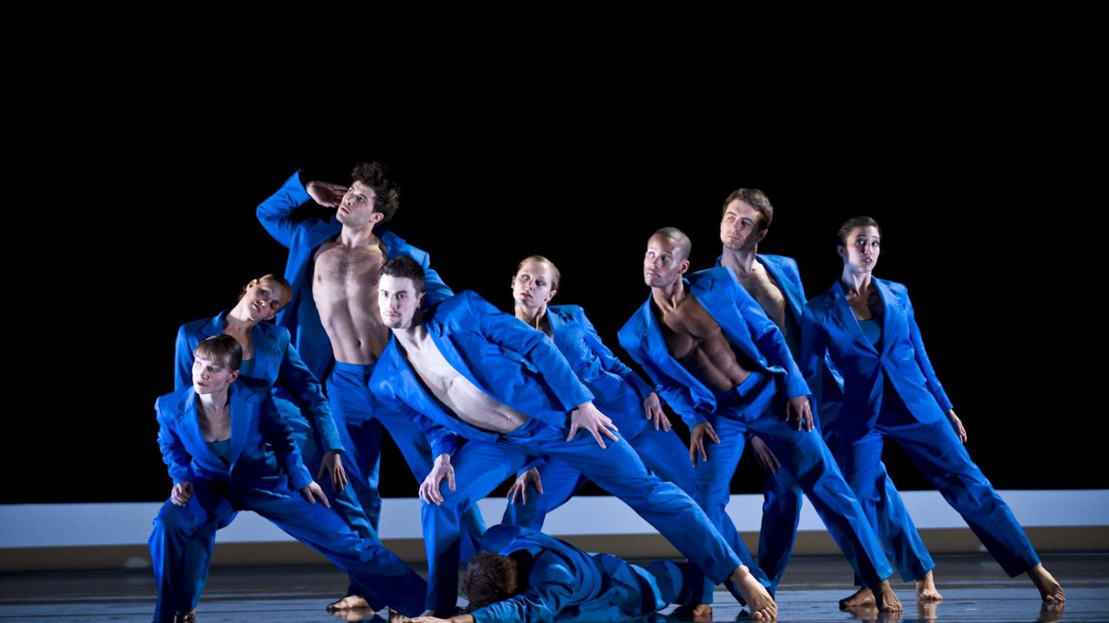 Actors in blue suits